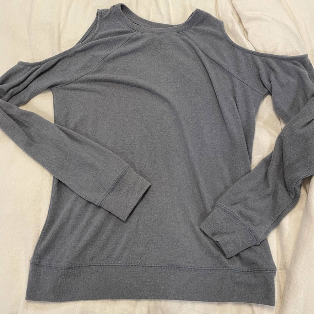Shirt with shoulder cut out